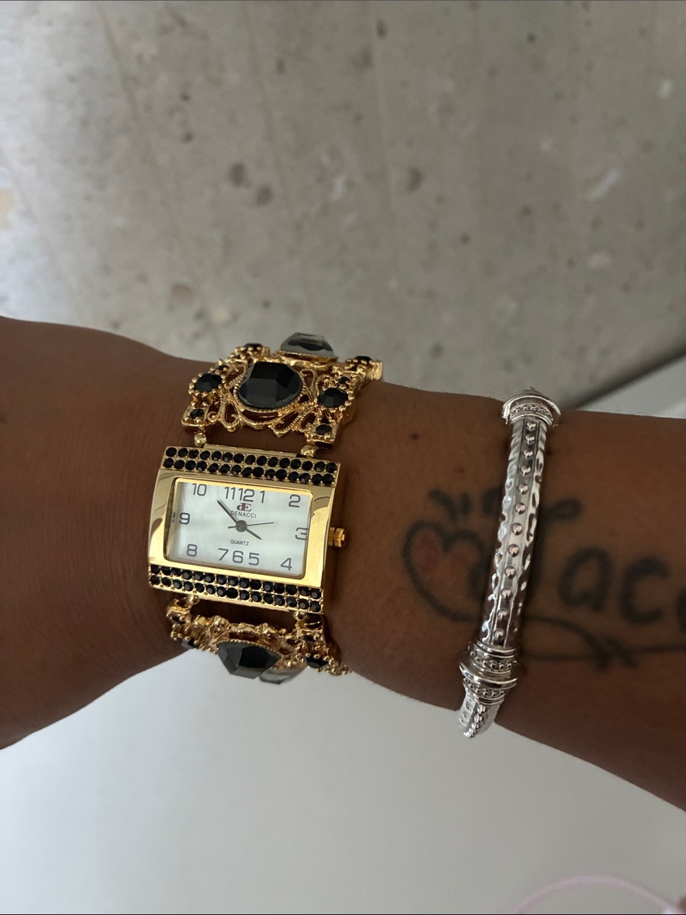 Gold-tone Women's Bracelet Watch with Black Stones